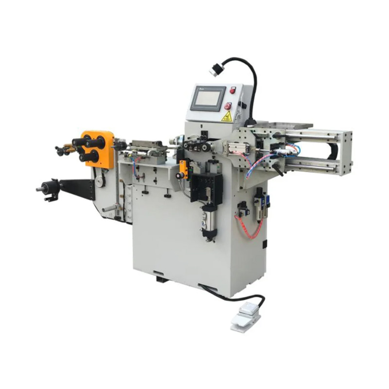 Automatisk tygomslagningsmaskin